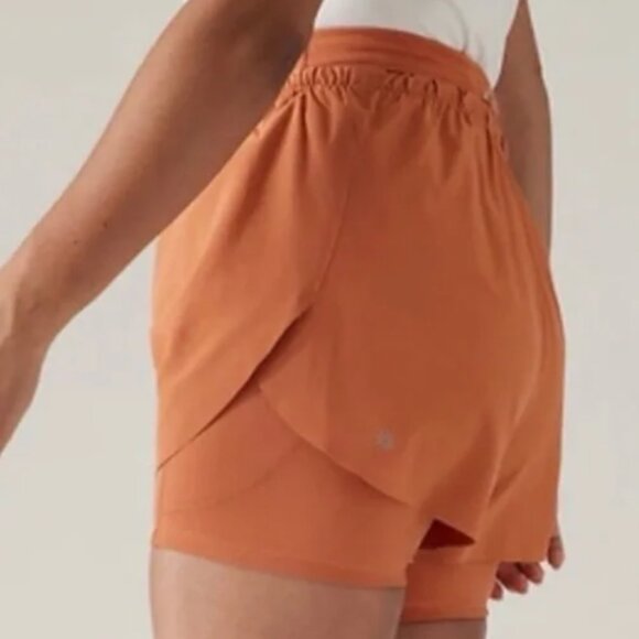 ATHLETA Mile Marker 2-In-1 Shorts Orange Size Small - Picture 1 of 10